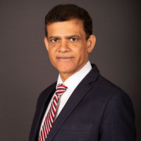 Anuj Puri-logo