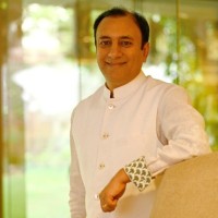 Puneet Dalmia-logo