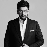 Yuvraj A. Thakker-logo
